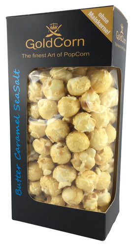 Produktabbildung: GoldCorn Karton mit GoldCorn Logo. Sichtfenster zu den enthaltenen Popcorn. Aufschriften: 